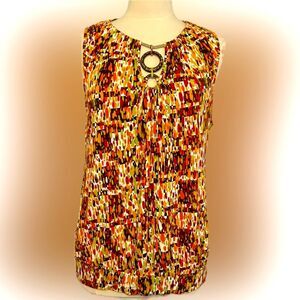 Like new! August Silk top-detailing colorful top!